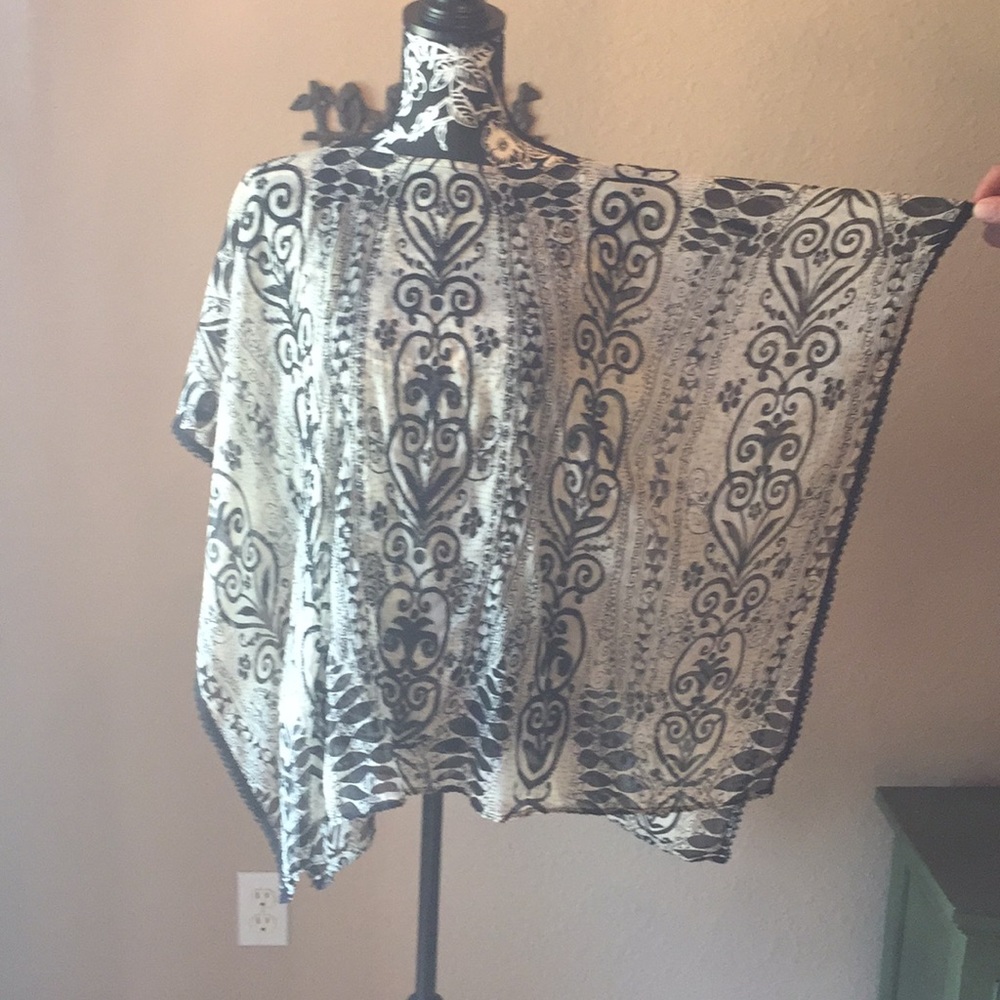 Ivory and black coverup